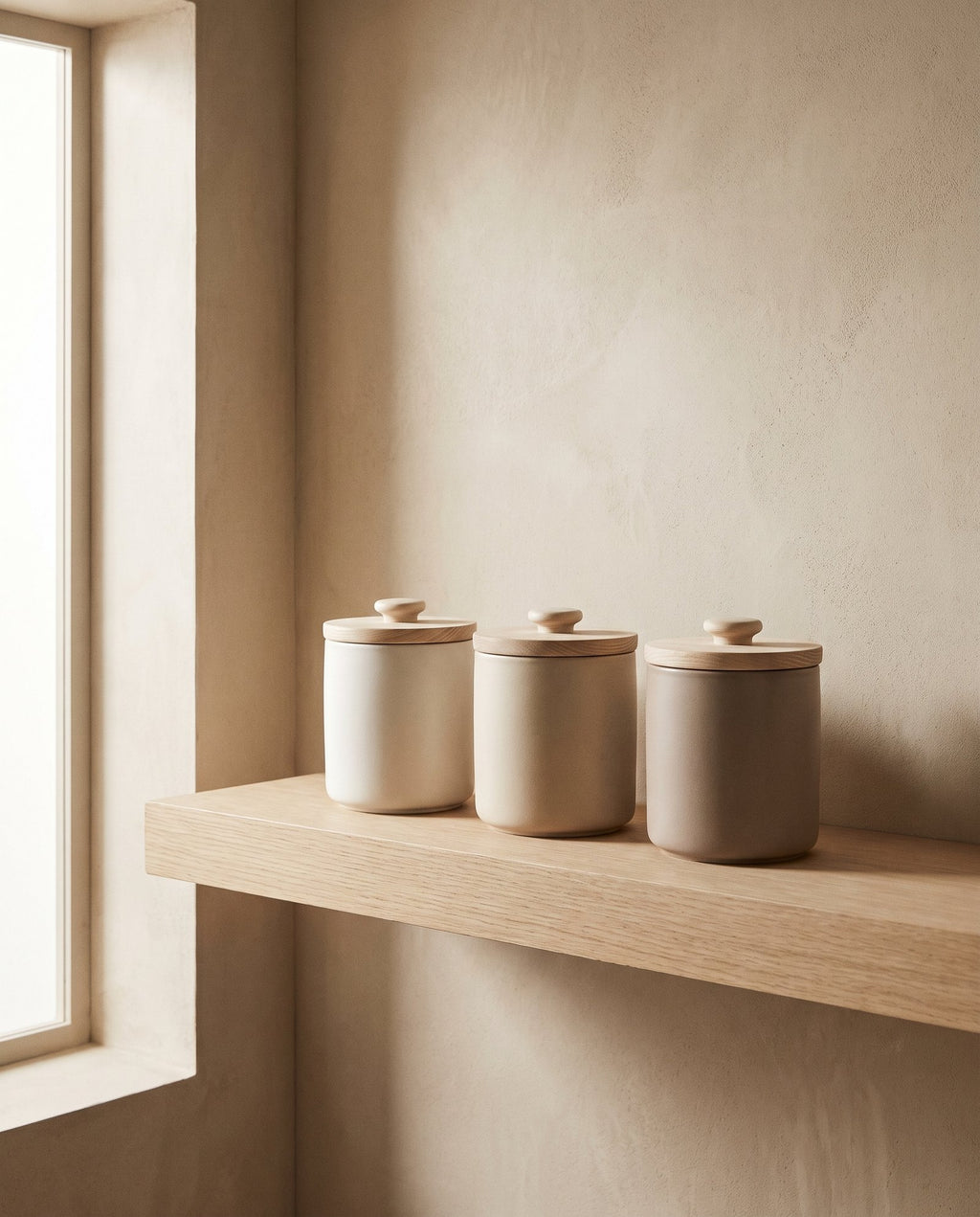 Canisters on an oak shelf