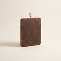 End-grain walnut cutting board with leather loop