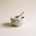 Cream marble mortar and pestle