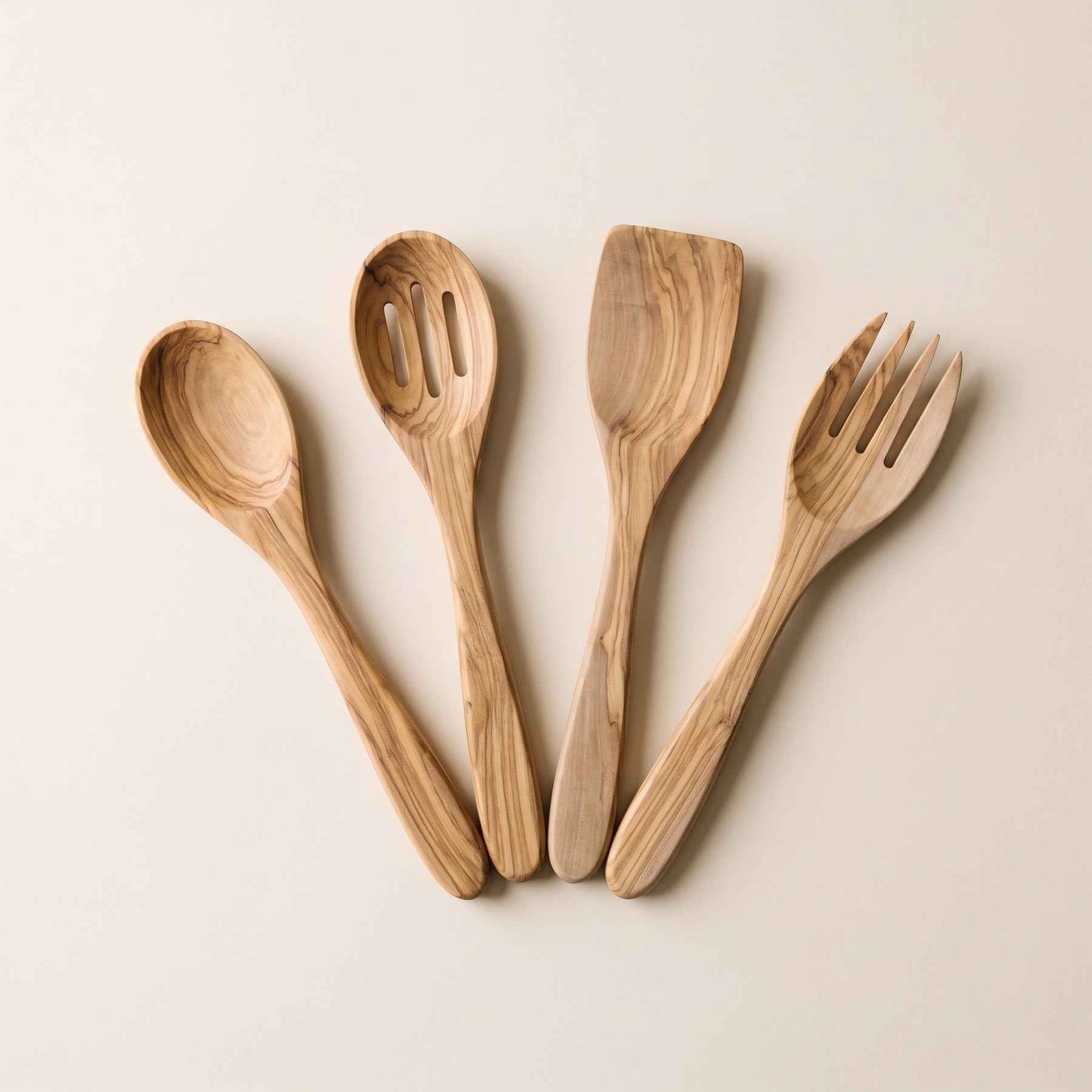 Set of four olive wood kitchen utensils